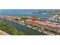 Waterfront condos with private boat docks and beautiful landscaping overlooking scenic bay views at 5000 Culbreath Key Way # 8-319, Tampa, FL 33611