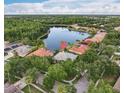 Stunning aerial view of a lakeside community with lush landscaping and beautiful homes at 10232 Estuary Dr, Tampa, FL 33647