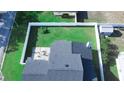 This aerial view displays the fenced backyard and patio seating area at 2797 Cordova S Way, St Petersburg, FL 33713