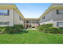 Well-maintained condo complex features lush green grass and mature landscaping creating a park-like setting at 2207 S Carolina Ave # 7, Tampa, FL 33629