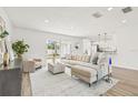 Spacious living room boasts ample natural light, stylish furnishings, and an open floor plan with backyard views at 2901 Forestwood Dr, Seffner, FL 33584