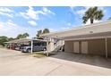 Covered parking area of condo complex; each unit is designated covered parking spot at 402 Laurel Lake Dr # 104, Venice, FL 34292