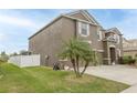 The house has nice green grass and is well-maintained at 621 Washita Stone Dr, Ruskin, FL 33570