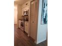 The kitchen has stainless steel appliances and granite counters at 7526 Needle Leaf Pl # 29, Tampa, FL 33617
