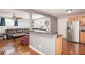 Living room and kitchen with an open floor plan, perfect for entertaining at 1310 Hilton Pl, Tampa, FL 33604