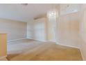Spacious living room with natural light and neutral tones, awaiting your personal touch at 24839 Wild Frontier Dr, Land O Lakes, FL 34639