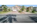 Charming two-story home with a spacious driveway and lush tropical landscaping at 6121 Fjord Way, New Port Richey, FL 34652