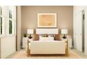 Serene bedroom with a neutral color scheme, soft lighting, and comfortable bedding for a relaxing retreat at 9582 Runaway Breeze Dr, Land O Lakes, FL 34637