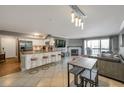 Bright open concept kitchen with a granite countertop island and stainless steel appliances at 2400 Feather Sound Dr # 1136, Clearwater, FL 33762