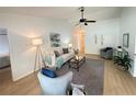 Bright open living room featuring vaulted ceilings, modern decor, and seamless flow to the bedrooms at 3621 102Nd N Pl, Clearwater, FL 33762
