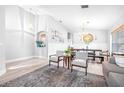 Open-concept living space with natural light, modern furnishings, and seamless flow for entertaining at 10357 Lightner Bridge Dr, Tampa, FL 33626