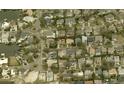 Prime location with a neighborhood aerial view, showcasing nearby water access, and a serene residential setting at 5029 W Dickens Ave, Tampa, FL 33629