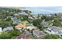 Prime real estate showcasing a spacious vacant lot surrounded by luxury homes in a desirable waterfront community at 5029 W Dickens Ave, Tampa, FL 33629