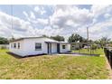 Inviting view of this charming home, featuring a well-kept lawn and a welcoming facade at 5210 S 80Th St, Tampa, FL 33619
