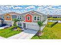 Charming two-story home with a pond view, and well-manicured lawn at 12710 Hysmith Loop, Parrish, FL 34219