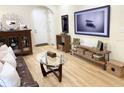 Inviting living room with hardwood floors, stylish decor, and a bright, airy feel at 514 S Orleans Ave # 4, Tampa, FL 33606