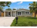 Charming single-story home with a well-manicured lawn and a classic mailbox at 6620 Del Prado Ter, New Port Richey, FL 34652
