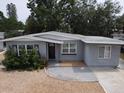 Charming single-story home with a well-maintained front yard and neutral gray paint at 6710 Hibiscus S Ave, South Pasadena, FL 33707