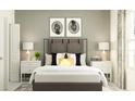 Inviting bedroom features neutral tones, comfortable bedding, and ambient lighting for a relaxing atmosphere at 11114 E 65Th Ter, Palmetto, FL 34221