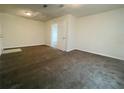 Cozy bedroom with neutral carpeting and a convenient closet at 206 Circle Hill Dr, Brandon, FL 33510