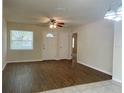 Inviting living room with wood laminate flooring and ample natural light at 206 Circle Hill Dr, Brandon, FL 33510