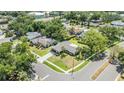 Aerial view of a lovely home with lush landscaping and a tranquil neighborhood setting at 2724 Ashwood Ct, Clearwater, FL 33761