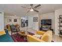 Spacious living area with an open concept, connecting the living room, dining area, and kitchen at 9481 Highland Oak Dr # 710, Tampa, FL 33647