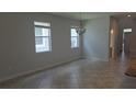 Cozy dining area featuring neutral walls, tiled flooring and natural light from two windows at 1022 Oliveto Verdi Ct, Brandon, FL 33511