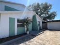 Charming house exterior with a well-manicured garden and a private driveway at 2068 San Marino N Way, Clearwater, FL 33763