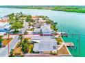Gorgeous waterfront home featuring a private dock and easy access to the open water at 365 La Hacienda Dr, Indian Rocks Beach, FL 33785