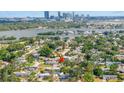Stunning aerial view showing the home's location relative to the water and the city skyline at 3843 Neptune Se Dr, St Petersburg, FL 33705