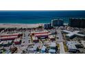 Bright aerial view showcasing a beachside community with nearby oceanfront at 650 70Th Ave, St Pete Beach, FL 33706