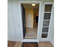 Inviting entryway showcasing tiled flooring and a glimpse into the bright, open floor plan at 7303 9Th W Ave # 7303, Bradenton, FL 34209