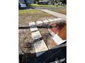 Walkway leading to the front door with decorative landscaping at 1778 New Hampshire Ne Ave, St Petersburg, FL 33703