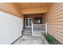 Charming front porch view with tiled flooring and a cozy entrance to the home at 2421 Lake Point Ln, Clearwater, FL 33762