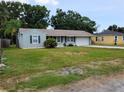 An inviting single-story home with a well maintained lawn and driveway at 2701 47Th N Ave, St Petersburg, FL 33714
