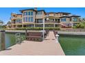 Private dock offers direct access to the water, enhancing this waterfront property at 100 Sands Point Dr, Tierra Verde, FL 33715