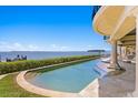 Gorgeous waterfront pool with a serene ocean view at 100 Sands Point Dr, Tierra Verde, FL 33715