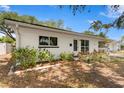 Well-maintained home with lovely landscaping and a welcoming entrance, creating an inviting first impression at 133 43Rd Ne Ave, St Petersburg, FL 33703