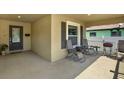 Cozy front porch with comfortable seating, ideal for relaxing and enjoying the outdoors at 3613 21St S Ave, St Petersburg, FL 33711