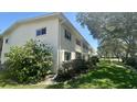 Exterior of multi-Gathering property with lush landscaping and manicured lawns at 4560 Overlook Ne Dr # 168, St Petersburg, FL 33703