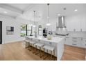Bright, open kitchen with a large island and white cabinetry at 816 W Orient St, Tampa, FL 33603