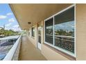 Wide balcony offers outdoor space with a view of the parking area at 5095 Bay Ne St # 210, St Petersburg, FL 33703