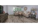 Cozy living room features stylish furniture, neutral tones, and modern decor at 5694 40Th N Ter # 423, Kenneth City, FL 33709