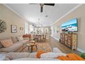 Open-concept living space flows seamlessly into the dining area and kitchen at 3543 Gamble St, New Port Richey, FL 34655