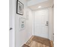 Bright entryway with door and stylish decor at 5712 Biscayne Ct # 103, New Port Richey, FL 34652