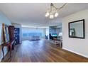 Spacious living room boasts hardwood floors and ample natural light with a scenic view at 6020 Shore S Blvd # 503, Gulfport, FL 33707
