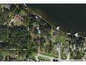 Aerial view of the property and the Palm River showing the proximity of the property to the water at 6610 Myrna Dr, Tampa, FL 33619