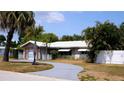 Charming single-story home featuring a well-maintained lawn and inviting curb appeal at 101 S Maywood Ave, Clearwater, FL 33765