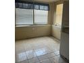 Bright breakfast nook with tiled floor and window views, adjacent to the kitchen, convenient dining at 1204 W Alsobrook St, Plant City, FL 33563
